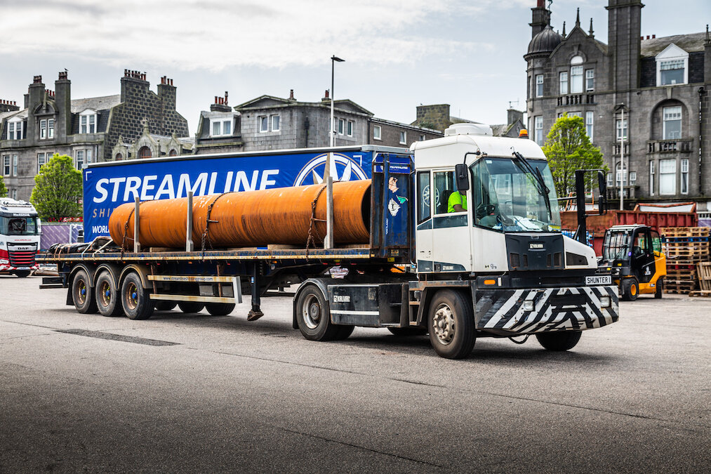 Modern fleet delivery truck showing part load and full load freight transport capabilities.